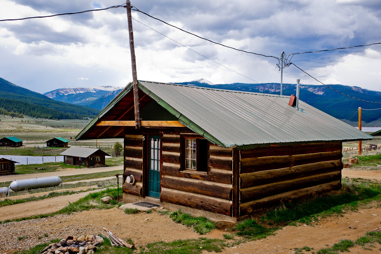 Wooden cabin with a blue door