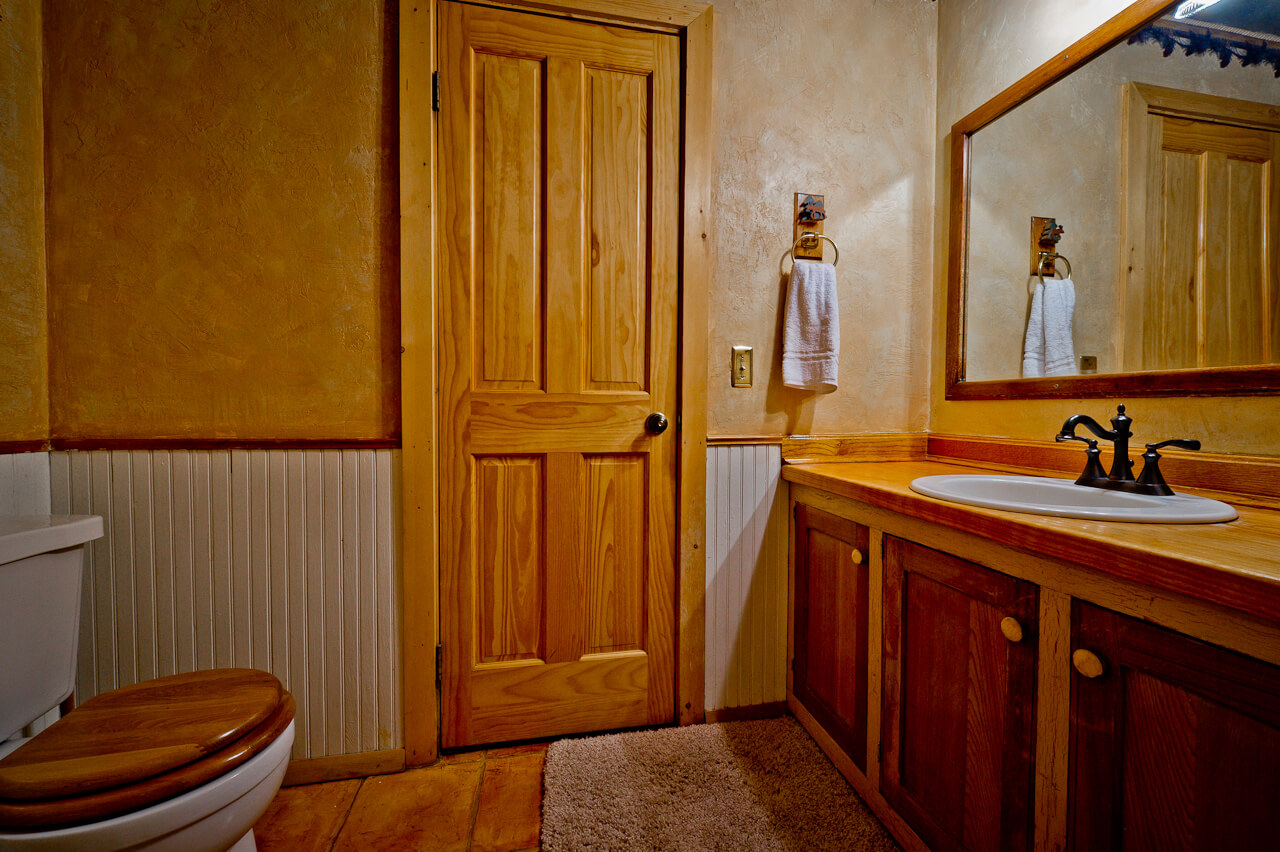 Bathroom made of wood and white walls
