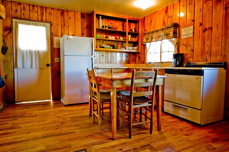 Wooden cabin kitchen and dining area