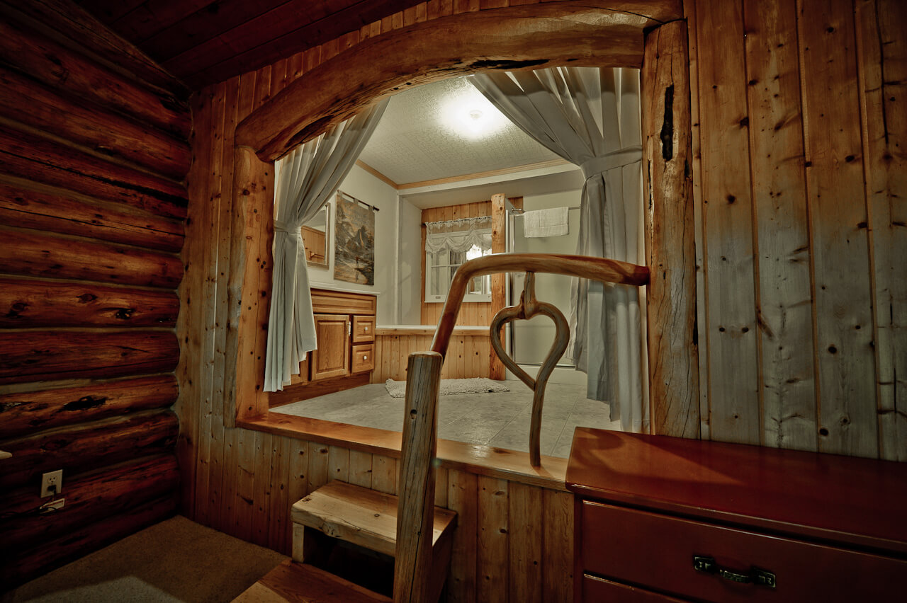 Wooden cabin with open doorway