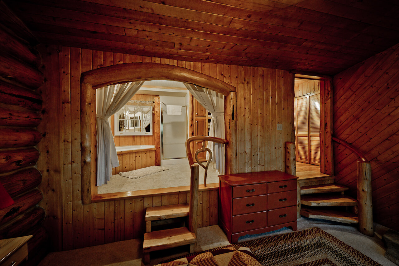 Wooden cabin with interior windows