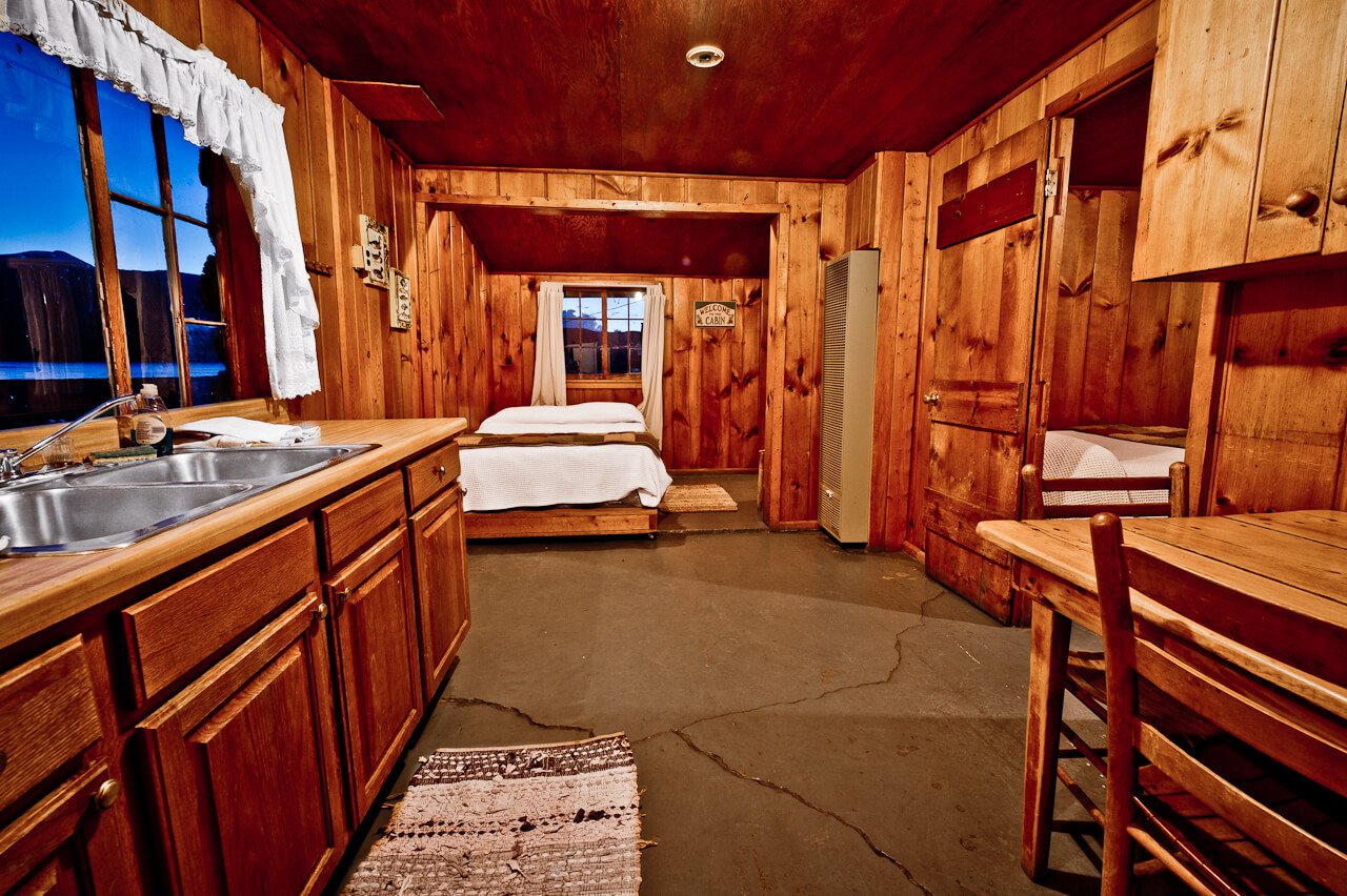 Wooden cabin bedroom and dining area