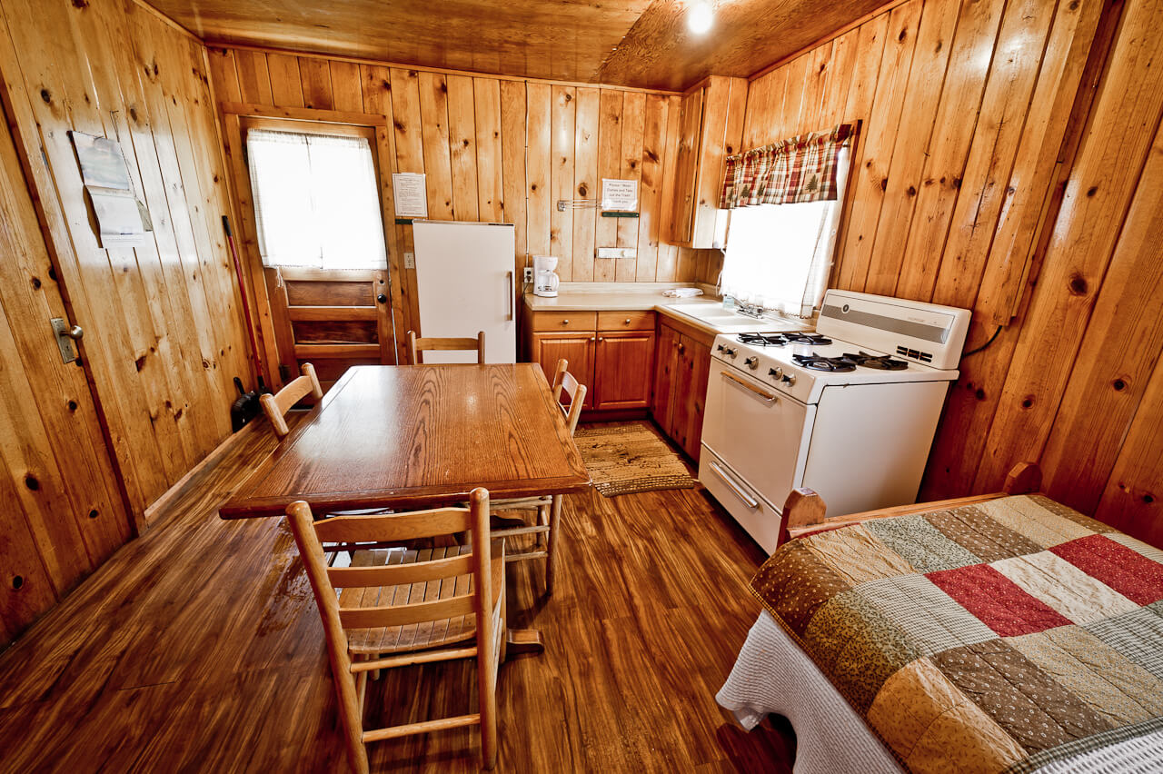 Wooden cabin kitchen and dining area