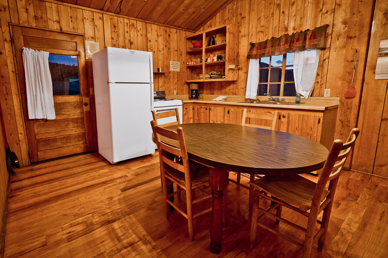 Wooden cabin kitchen and dining area