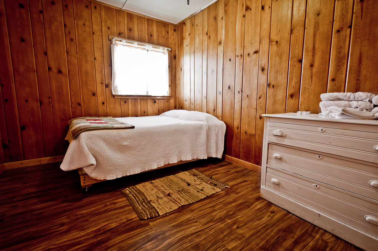 Wooden cabin bedroom