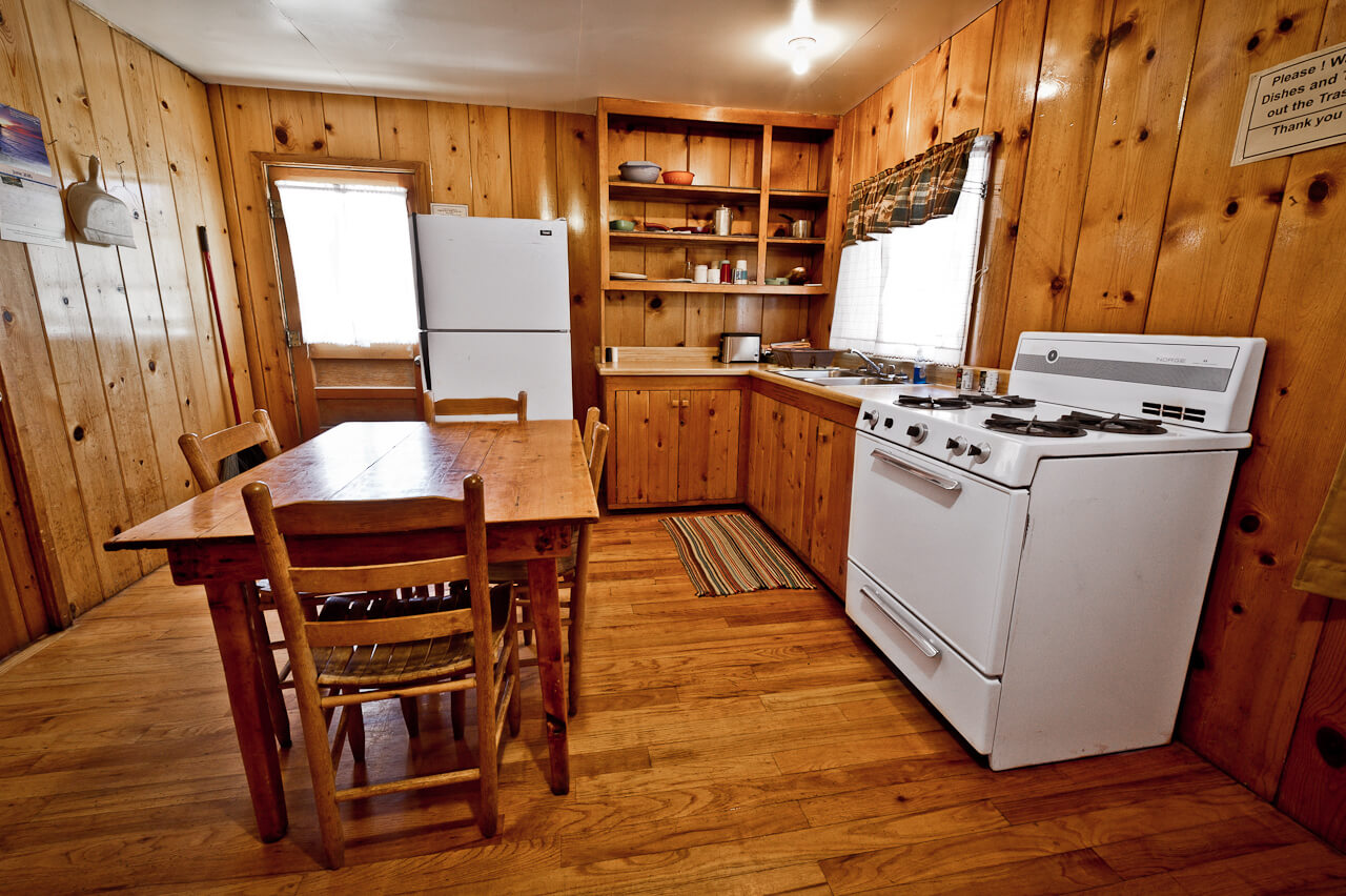 Wooden cabin kitchen and dining area