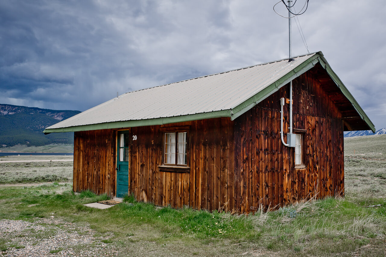 Wooden cabin with green door