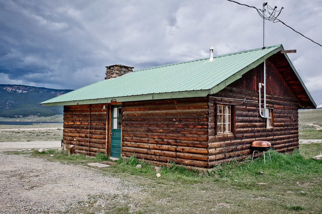 Wooden cabin with green door