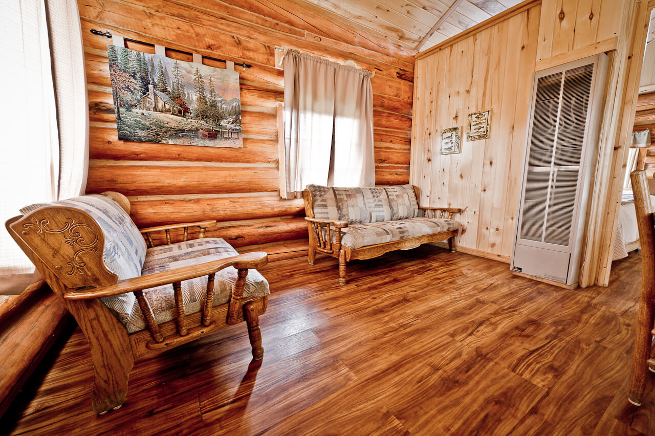 Wooden cabin with sofas